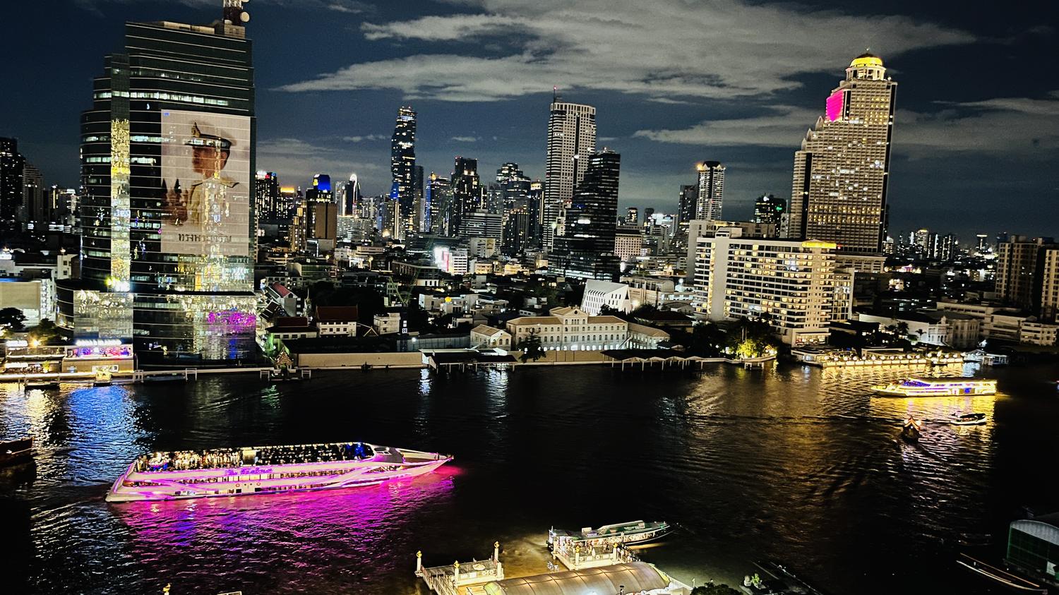 Bangkok skyline and the Chao Phraya river at night