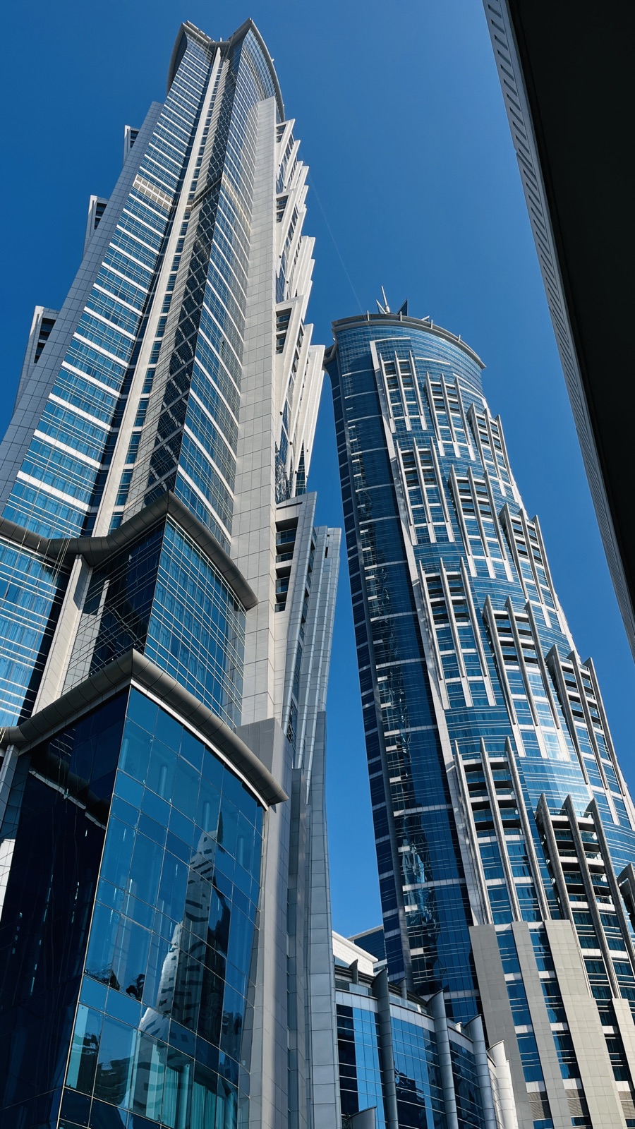 JW Marriott Marquis Dubai exterior — twin towers along Sheikh Zayed Road
