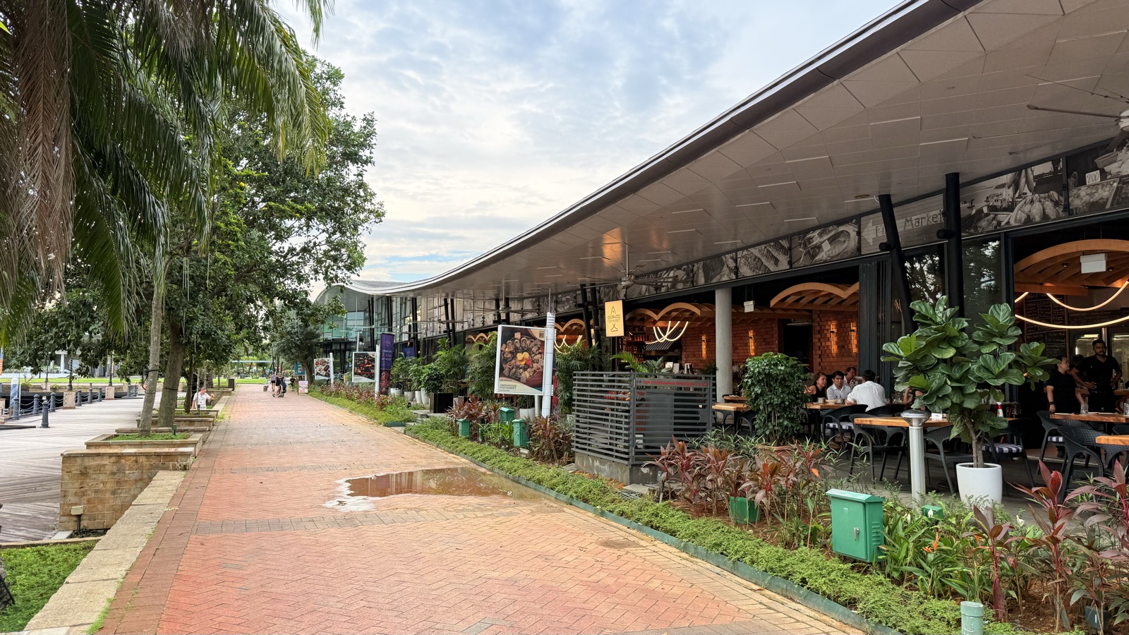 The waterfront walk and marina restaurants beside W Singapore — Sentosa Cove